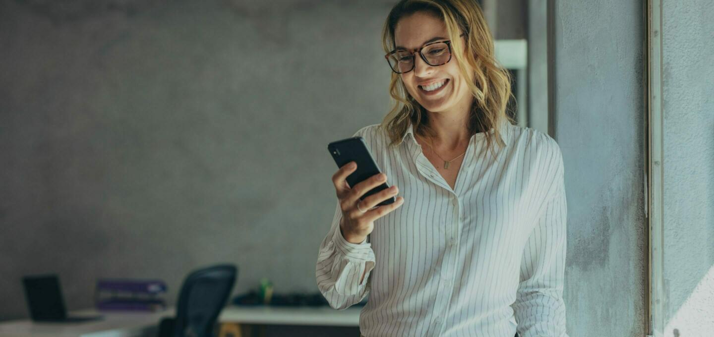 News woman phone smiling